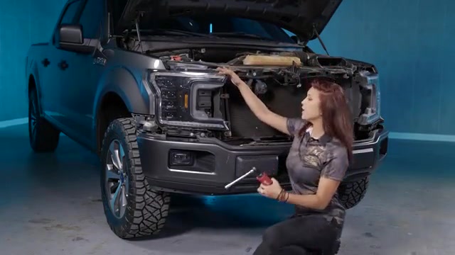 Removing the upper bumper trim piece on a Ford F-150
